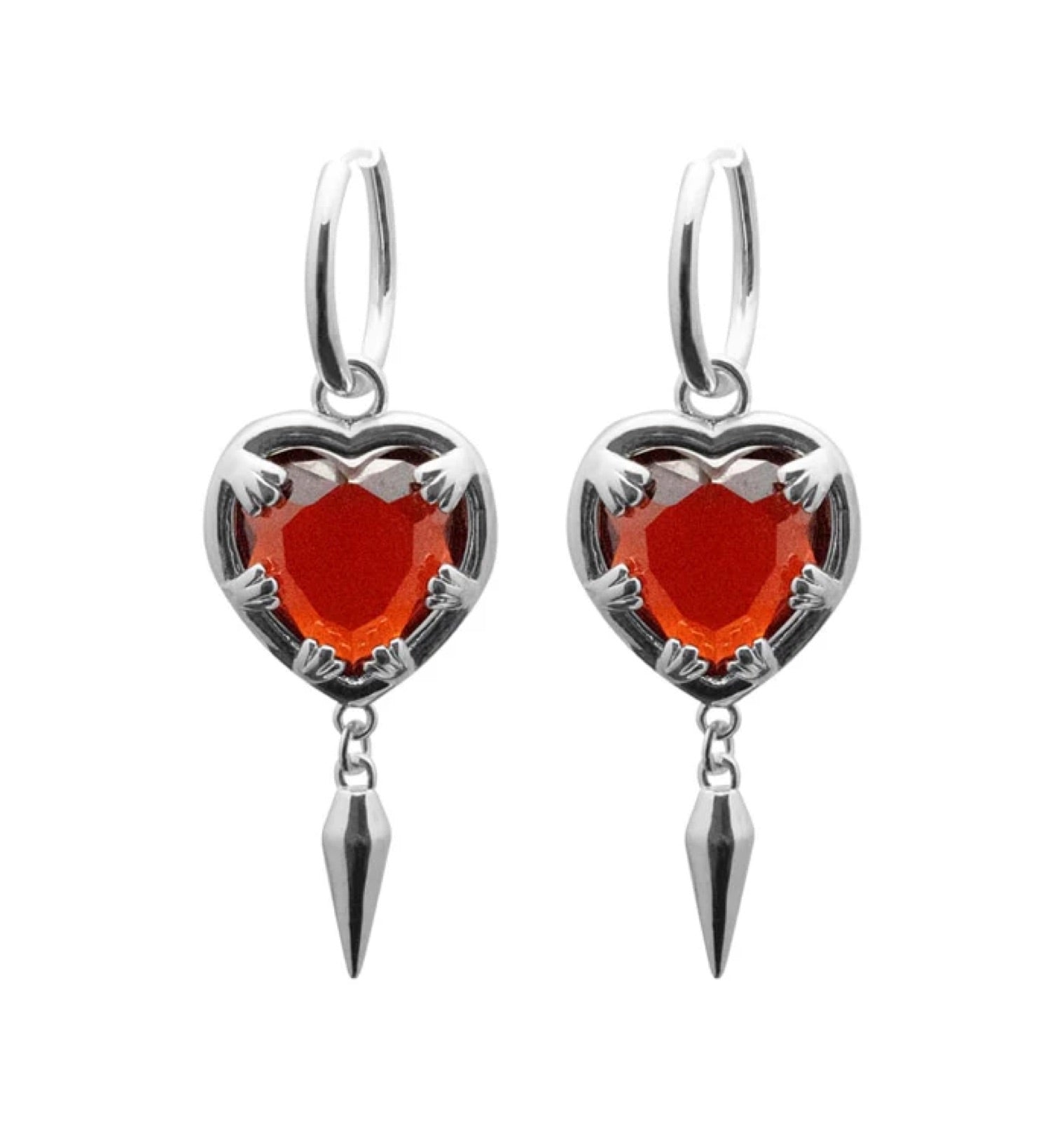 Claw heart big silver - BECCASIN STORE - Silver heart-shaped örhänge with red gem center and dangling spike smycke detail.